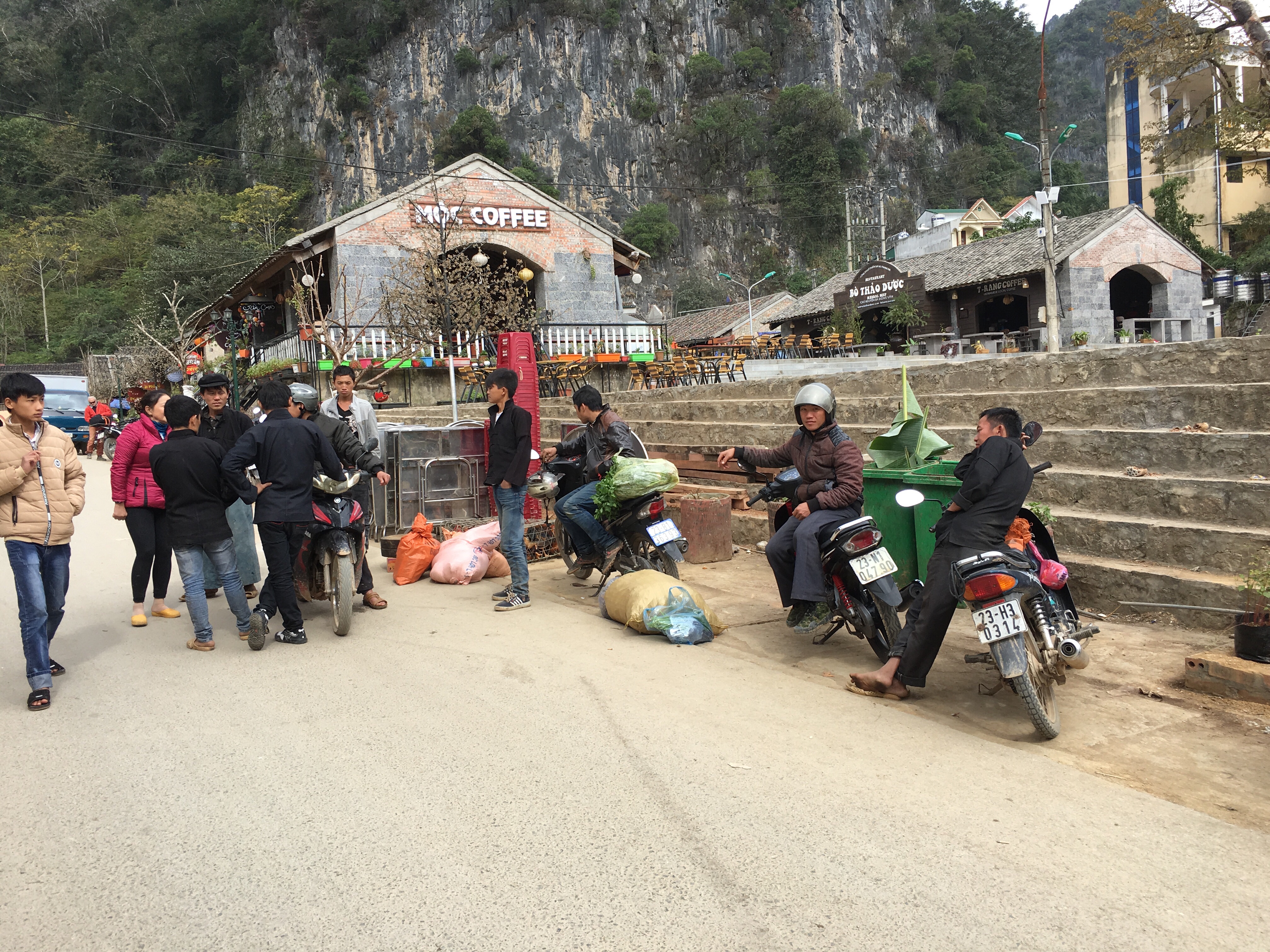 Men hanging out in town. All day long. 